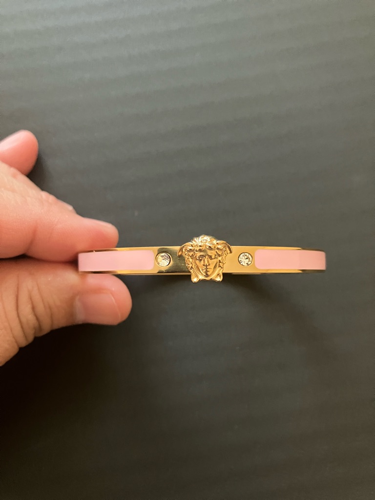 Gold-Tone Pink Medusa Bangle Bracelet